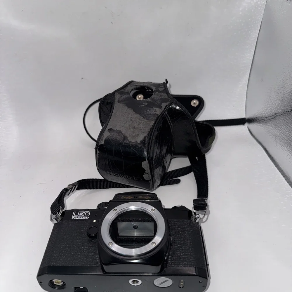 Chinon LED Promaster 35mm SLR Film Camera with Two Lenses‎ and A Flash Untested